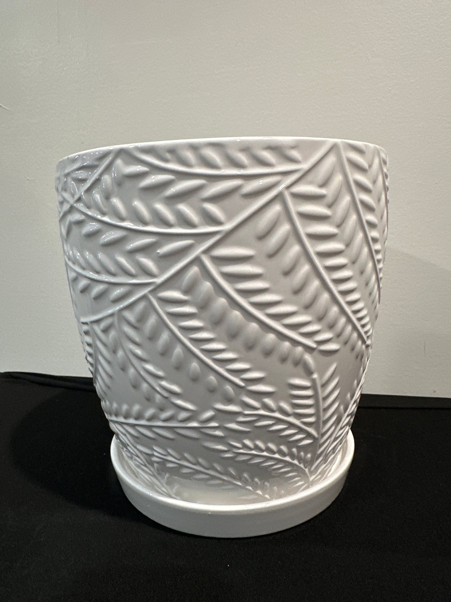 7.5” white planter with raised leaf pattern and attached saucer