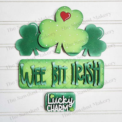 St Patrick's Day door hangers and interchangeable trucks at Wandering Roots 2/27/26