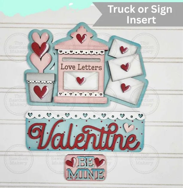 Valentine door hangers and interchangeable trucks at Wandering Roots 1/17/26