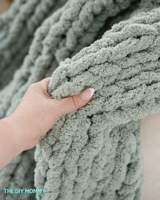 Chunky hand knit blanket at Wandering Roots
