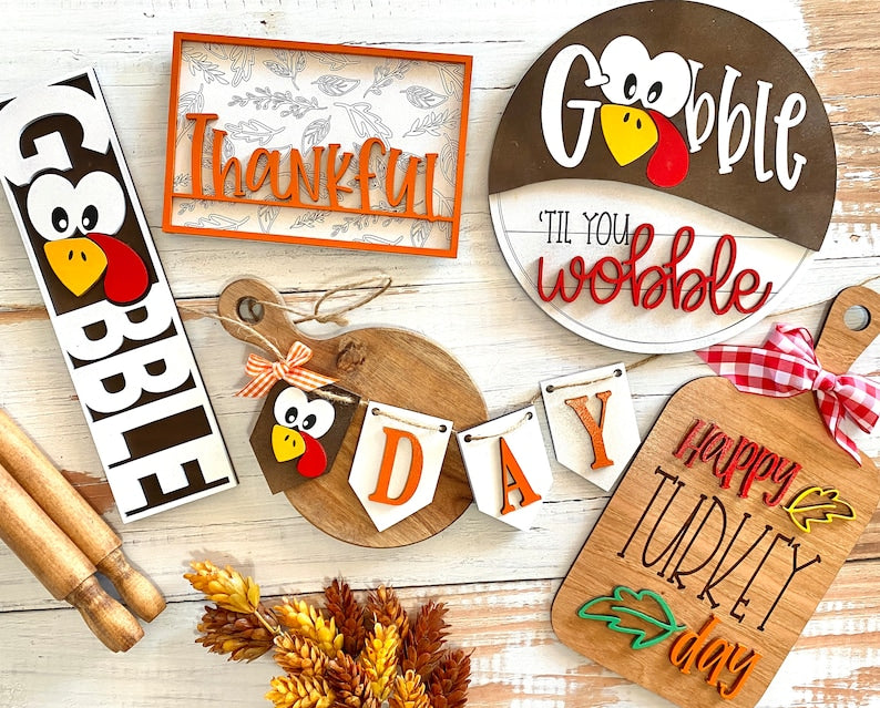 Thanksgiving door hangers, tiered tray sets and interchangeable trucks