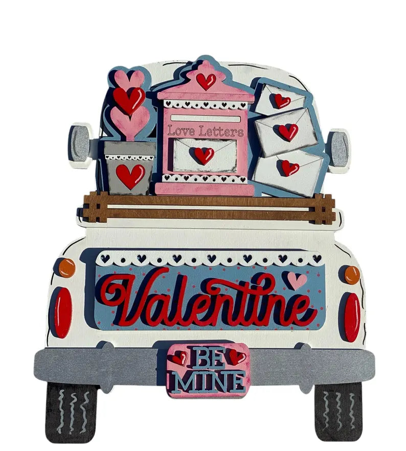 Valentine door hangers and interchangeable trucks at Wandering Roots 1/17/26
