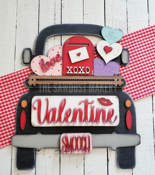 Valentine door hangers and interchangeable trucks at Wandering Roots 1/17/26