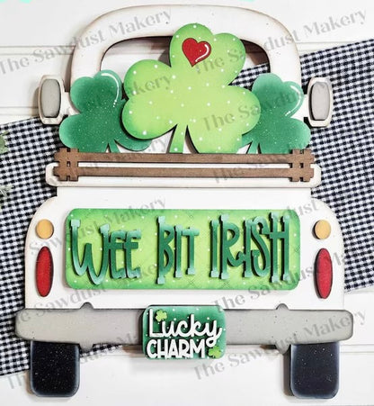 St Patrick's Day door hangers and interchangeable trucks at Wandering Roots 2/27/26